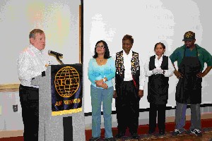 In March, Terry Whitlock (l), chapter assistant vice president, honors the Commons staff for the support they provided to the chapter during their luncheons at Fort McPherson.